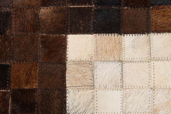 5' x 7' 11 Cowhide Stocks Rug