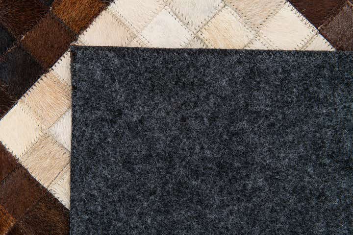 5' x 7' 11 Cowhide Stocks Rug