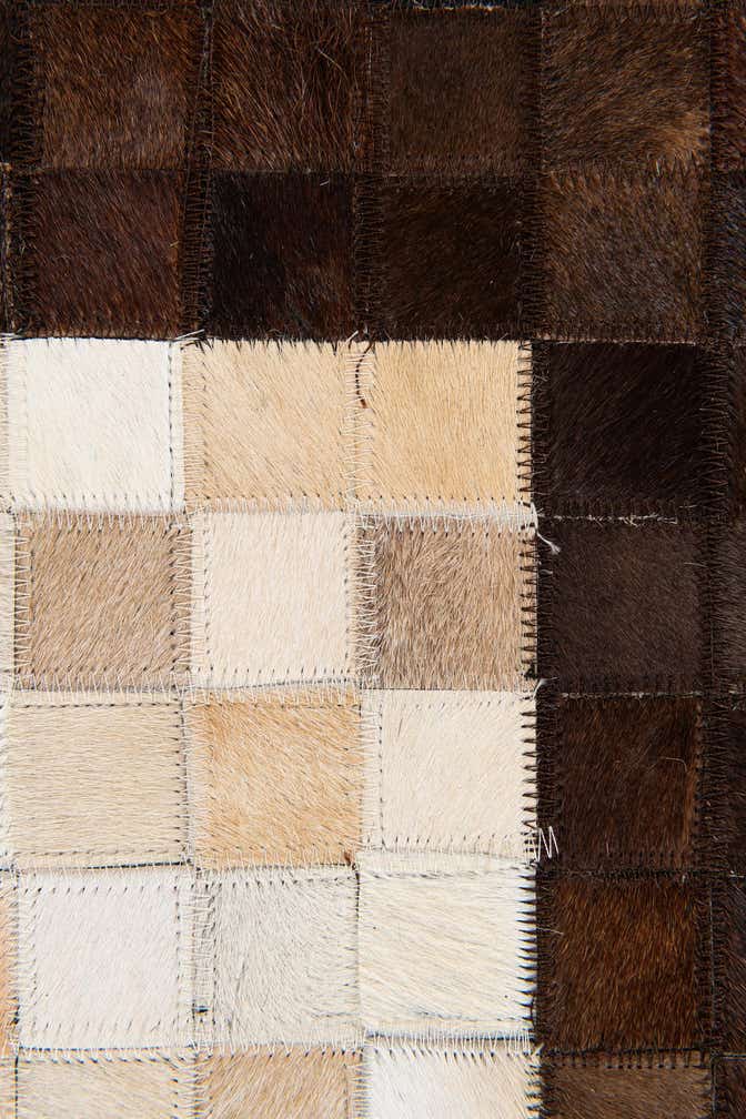 5' x 7' 10 Cowhide Stocks Rug