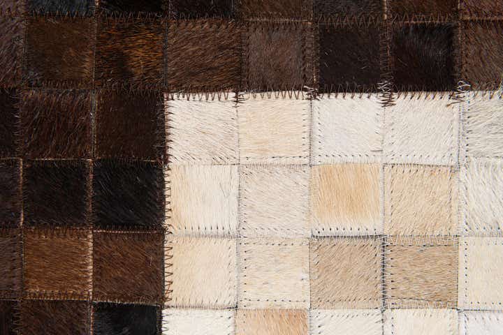 5' 1 x 7' 11 Cowhide Stocks Rug