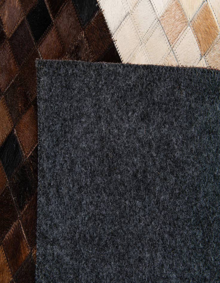 Detail image of 5' 1 x 8' Cowhide Stocks Rug