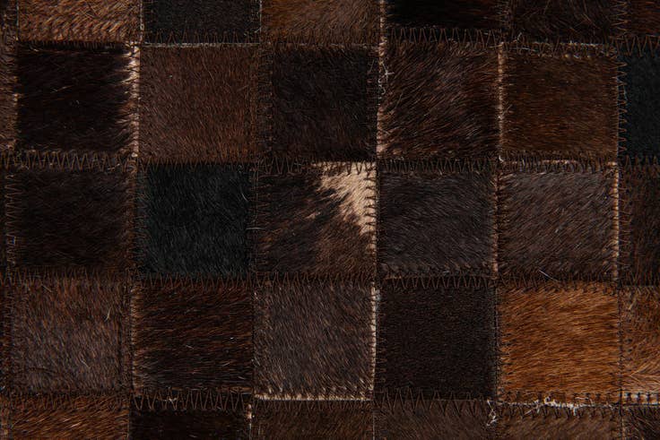 Detail image of 5' x 7' 10 Cowhide Stocks Rug