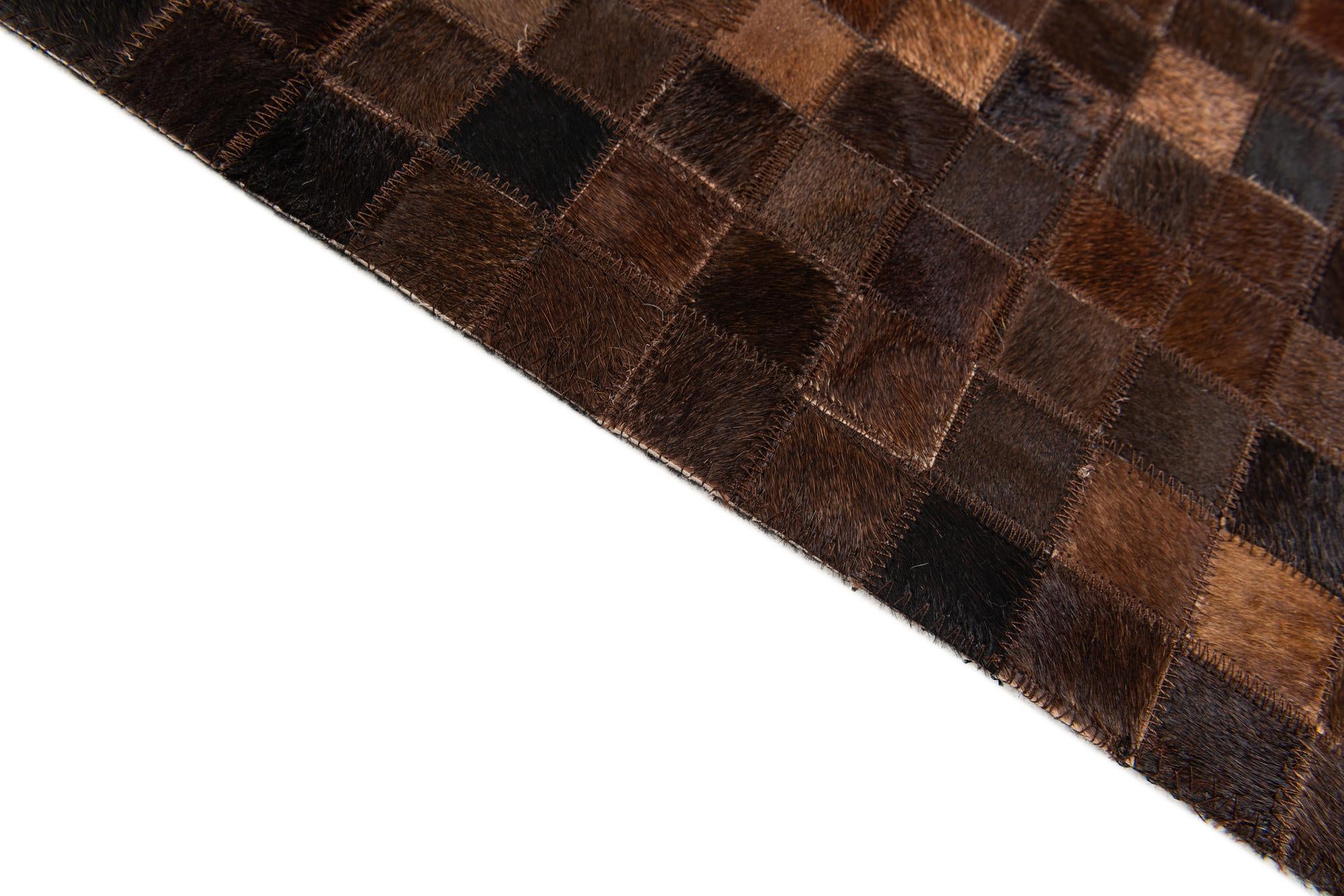 5' x 7' 10 Cowhide Stocks Rug