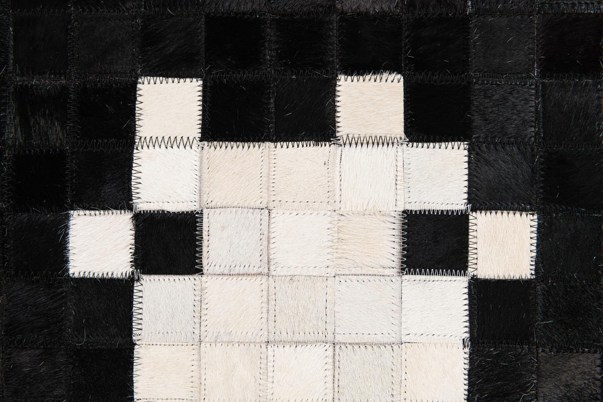 5' x 7' 10 Cowhide Stocks Rug