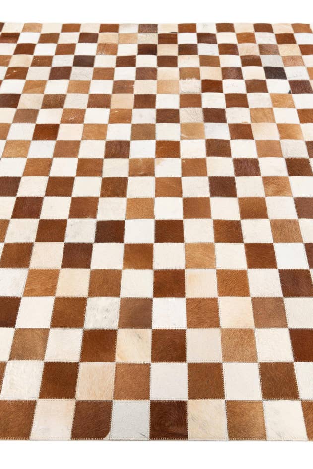 Detail image of 5' x 7' 11 Cowhide Stocks Rug