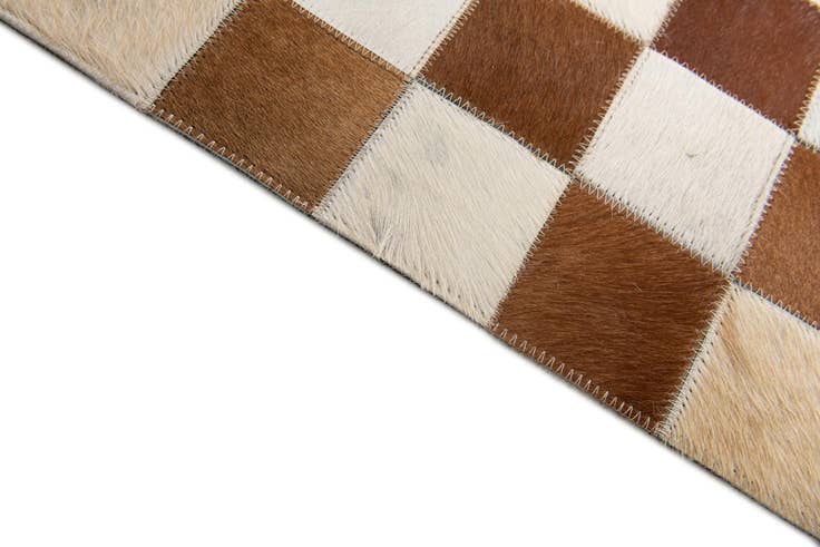 Detail image of 5' x 7' 11 Cowhide Stocks Rug