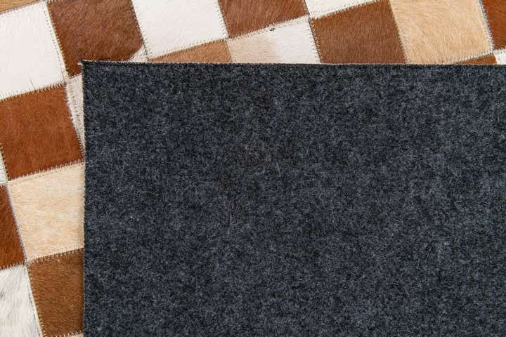 5' x 7' 11 Cowhide Stocks Rug