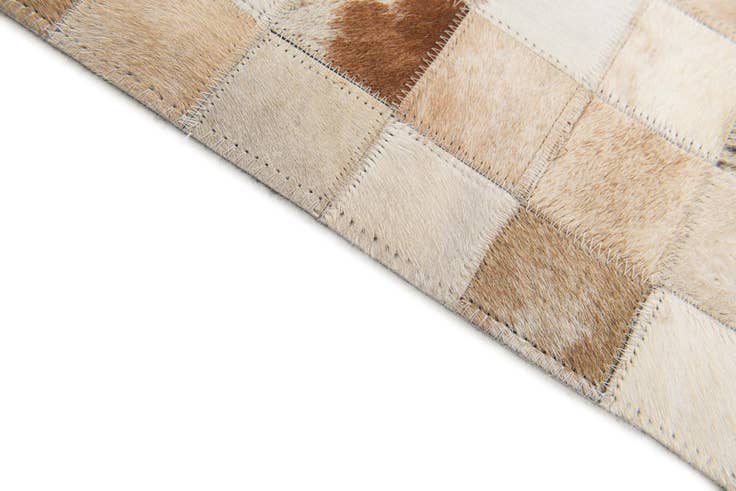 Detail image of 4' 10 x 7' 9 Cowhide Stocks Rug
