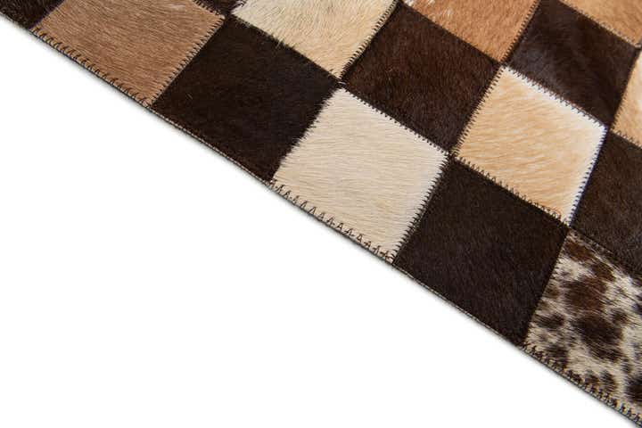 5' x 7' 11 Cowhide Stocks Rug