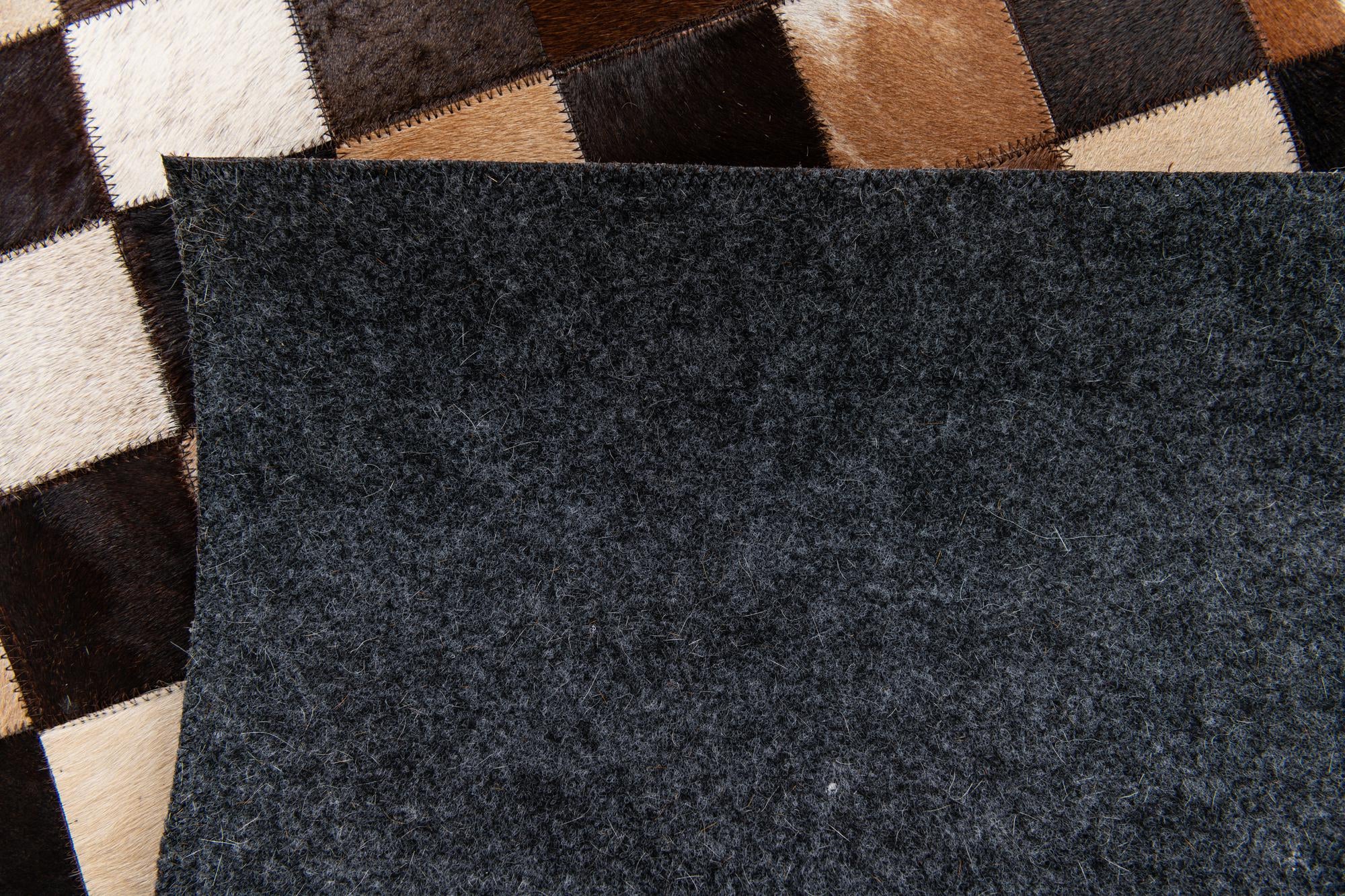 5' x 7' 11 Cowhide Stocks Rug