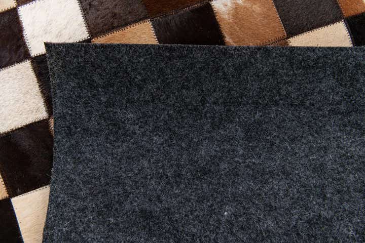 5' x 7' 11 Cowhide Stocks Rug