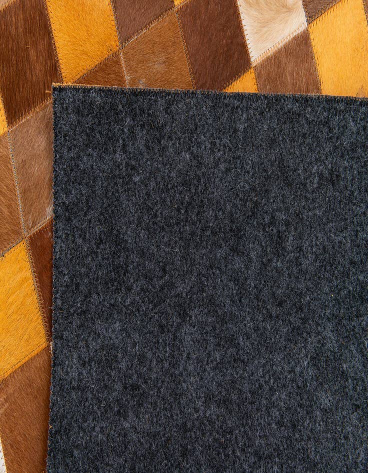 Detail image of 5' x 7' 11 Cowhide Stocks Rug