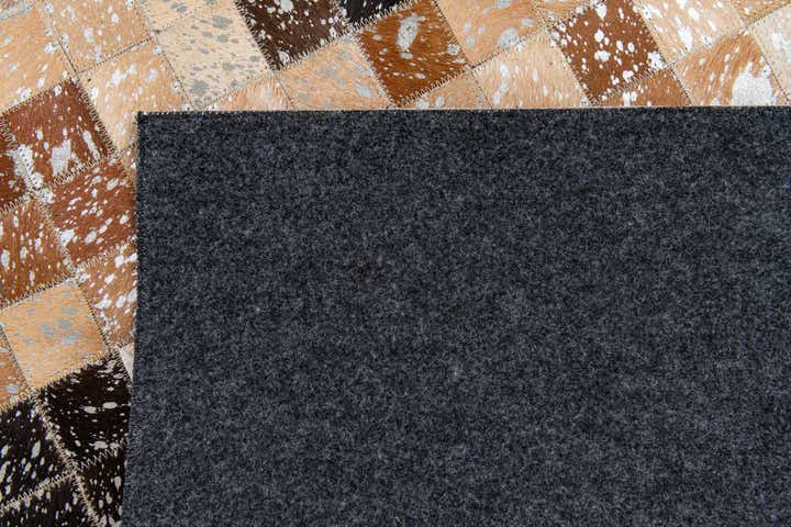5' 3 x 7' 7 Cowhide Stocks Rug