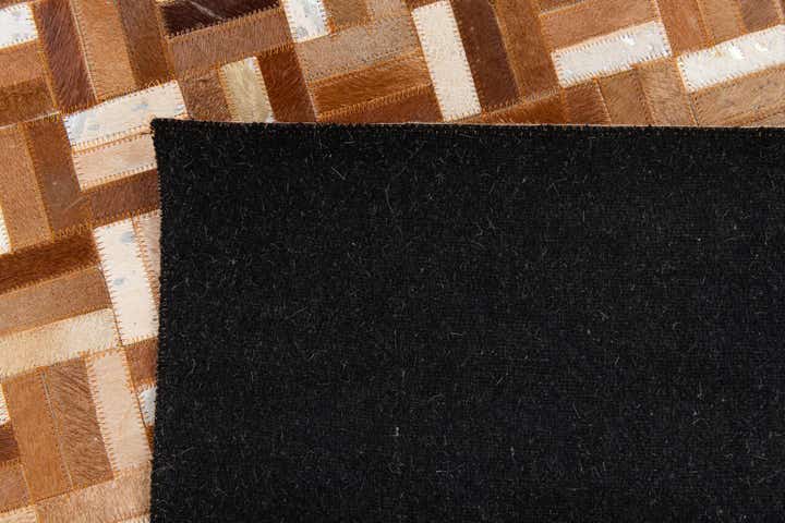5' x 8' Cowhide Stocks Rug