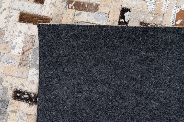 5' 2 x 7' 6 Cowhide Stocks Rug
