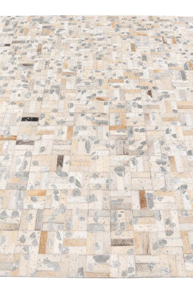 Detail image of 4' 11 x 8' 1 Cowhide Stocks Rug