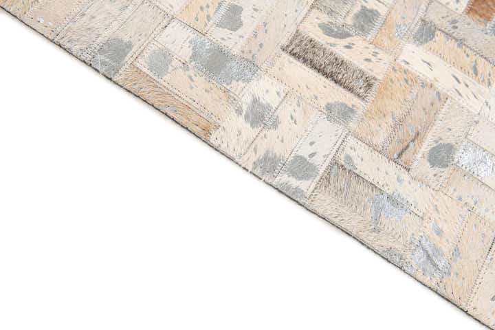 4' 11 x 8' 1 Cowhide Stocks Rug