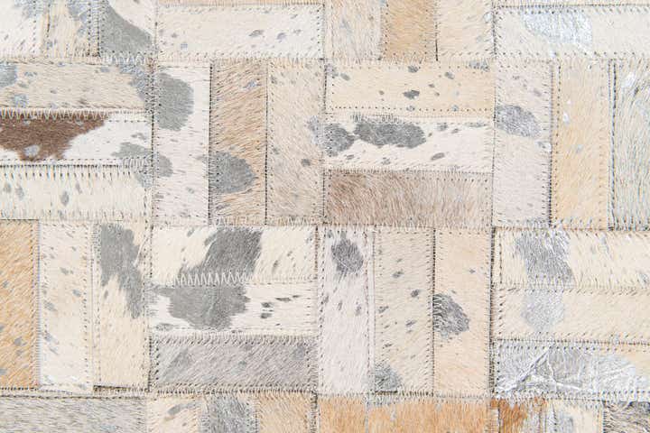4' 11 x 8' 1 Cowhide Stocks Rug