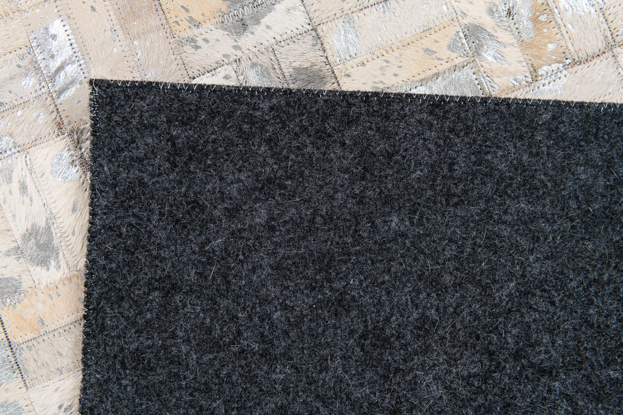 4' 11 x 8' 1 Cowhide Stocks Rug