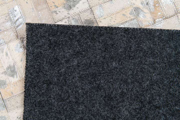 4' 11 x 8' 1 Cowhide Stocks Rug