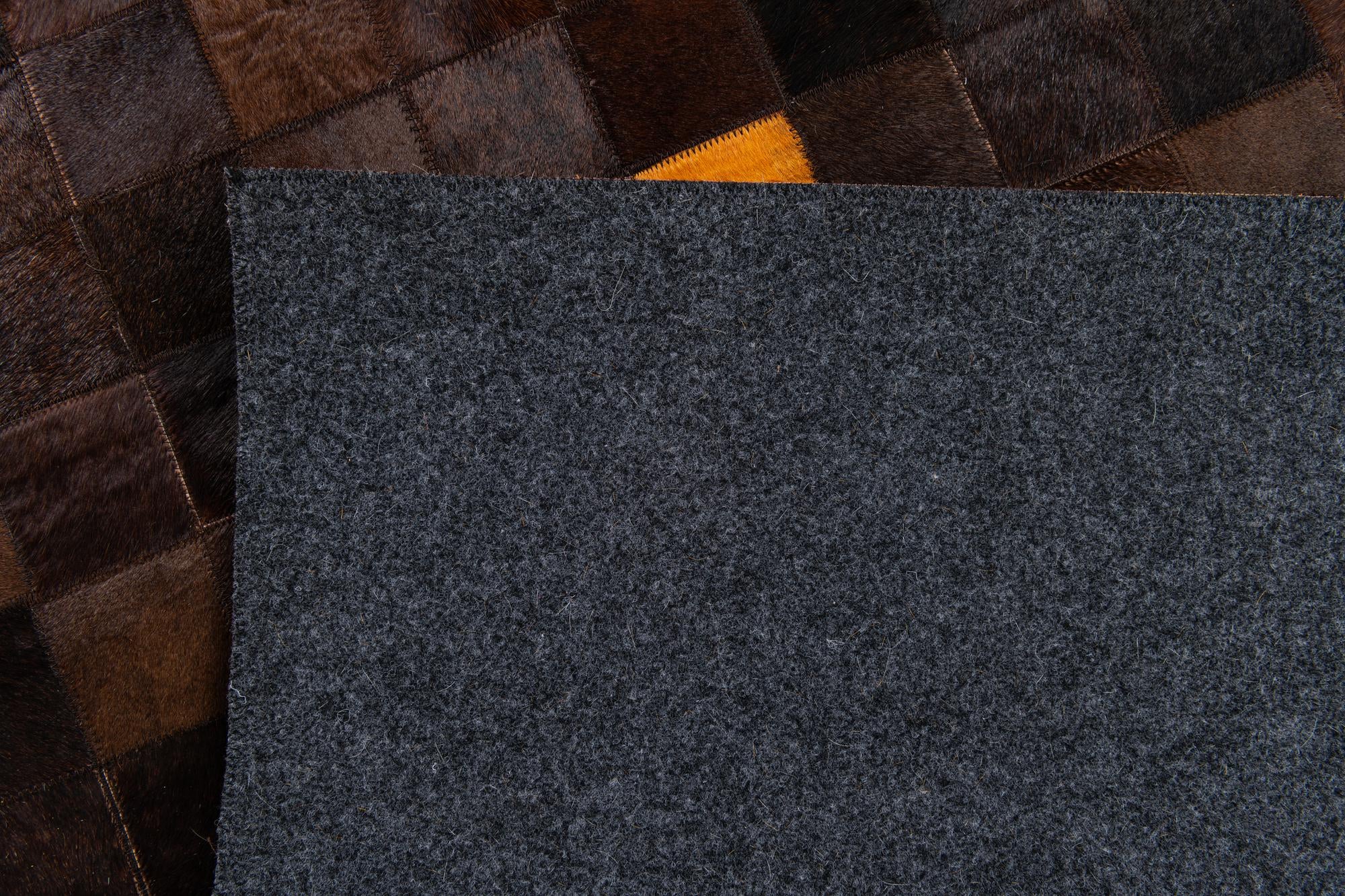 5' 2 x 8' 1 Cowhide Stocks Rug