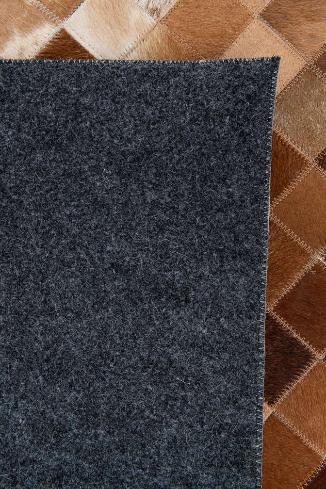 4' 11 x 8' Cowhide Stocks Rug