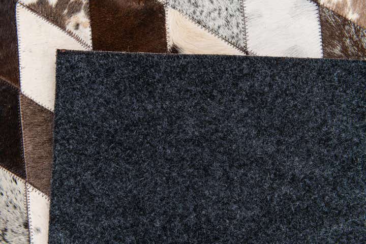 6' 9 x 9' 9 Cowhide Stocks Rug