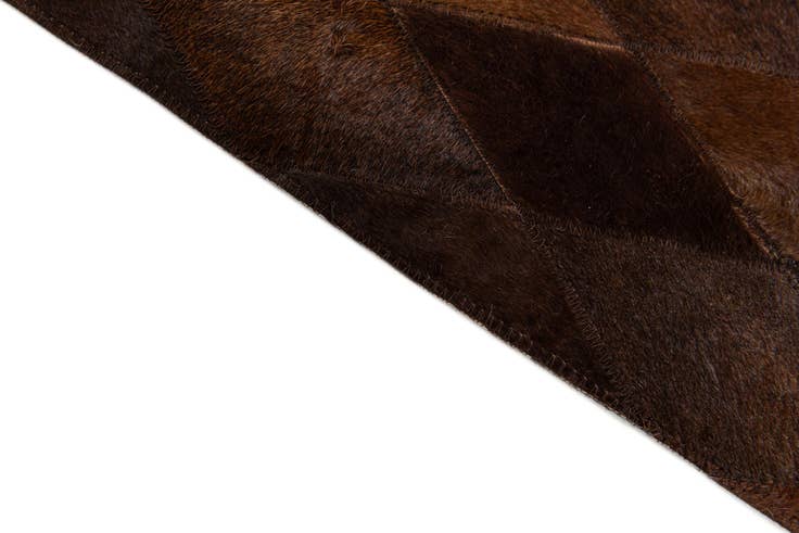 Detail image of 4' 8 x 6' 7 Cowhide Stocks Rug