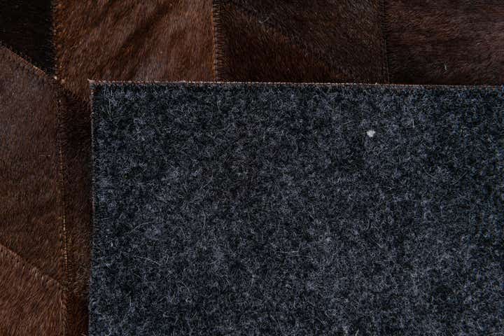4' 8 x 6' 7 Cowhide Stocks Rug