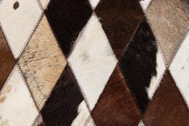 4' 8 x 6' 9 Cowhide Stocks Rug