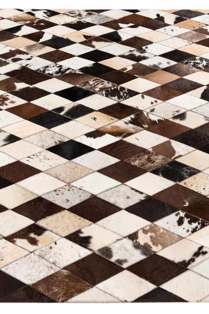4' 8 x 6' 9 Cowhide Stocks Rug