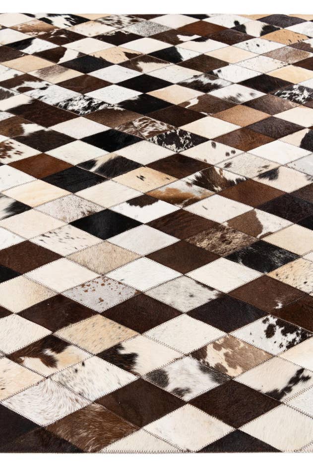 Detail image of 4' 8 x 6' 9 Cowhide Stocks Rug