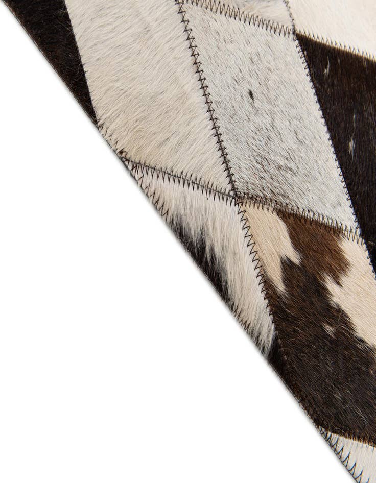 Detail image of 4' 8 x 6' 9 Cowhide Stocks Rug