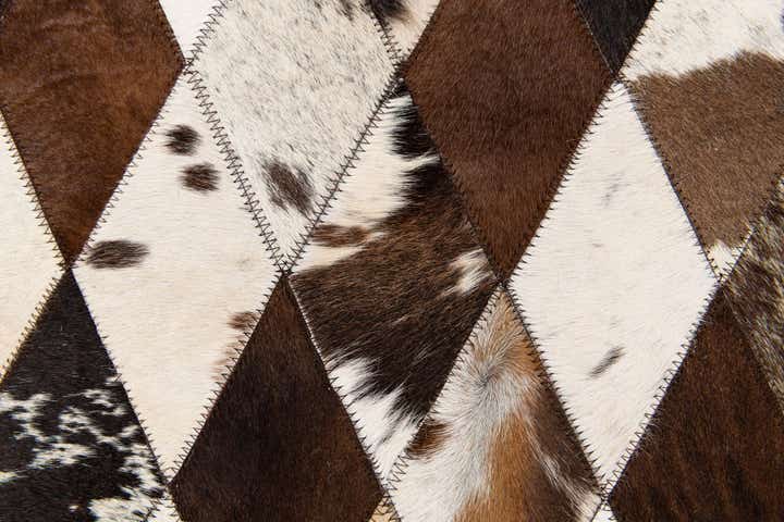 4' 8 x 6' 9 Cowhide Stocks Rug