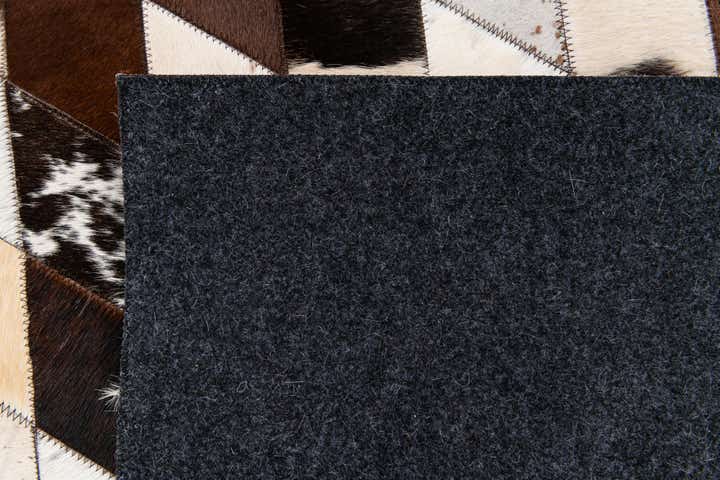 4' 8 x 6' 9 Cowhide Stocks Rug