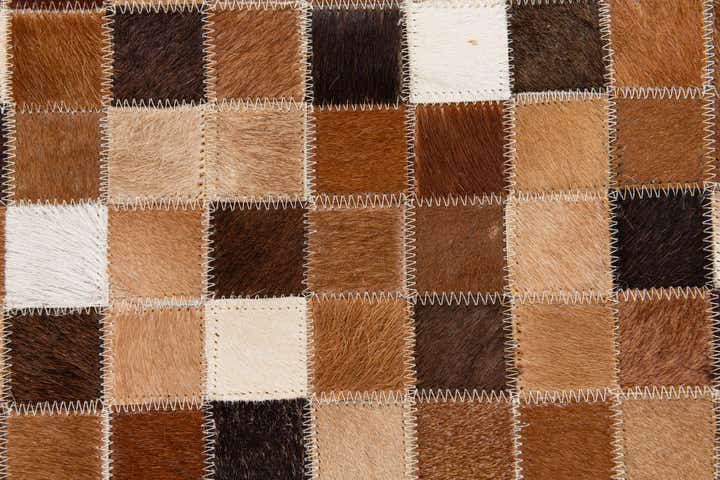 4' 8 x 6' 8 Cowhide Stocks Rug