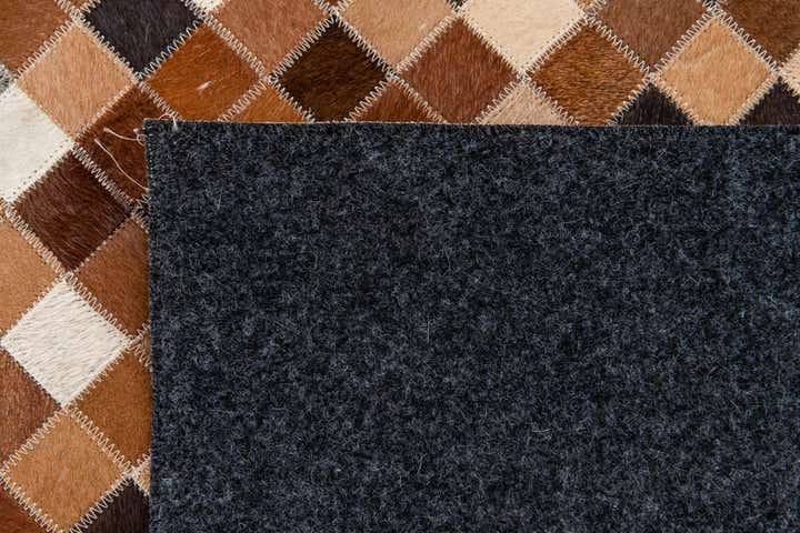 4' 8 x 6' 8 Cowhide Stocks Rug