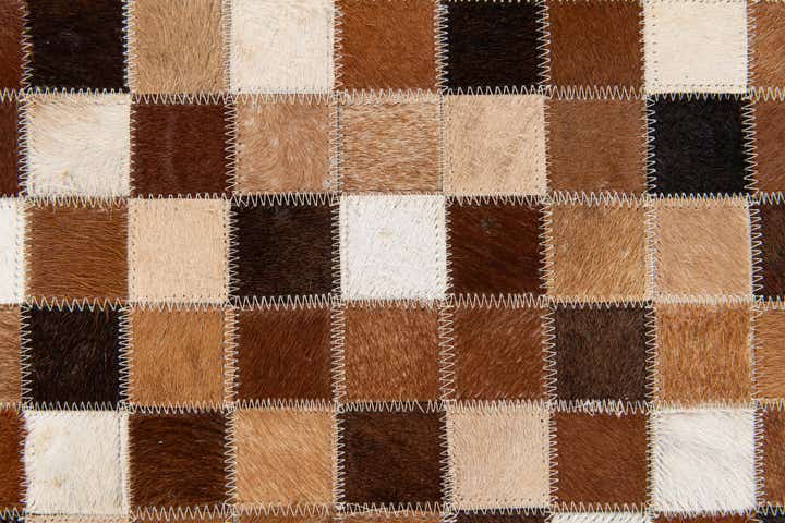 4' 8 x 6' 8 Cowhide Stocks Rug