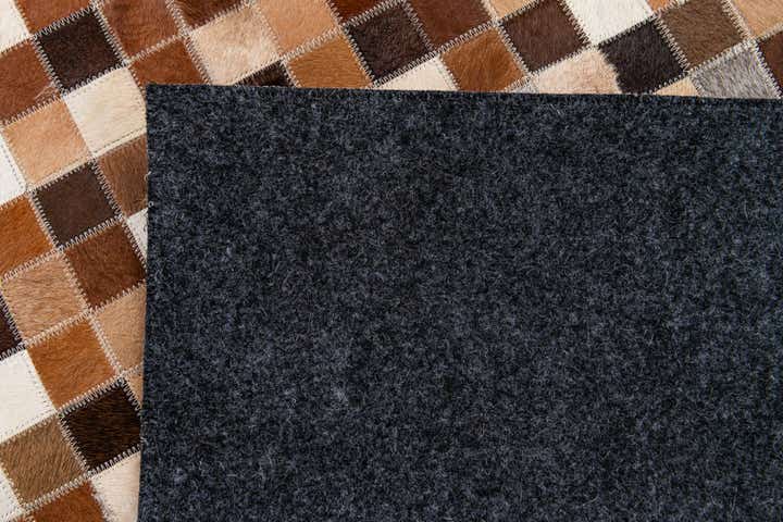 4' 8 x 6' 8 Cowhide Stocks Rug