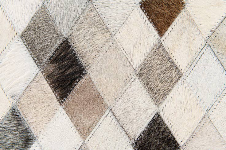 Detail image of 4' 7 x 6' 7 Cowhide Stocks Rug