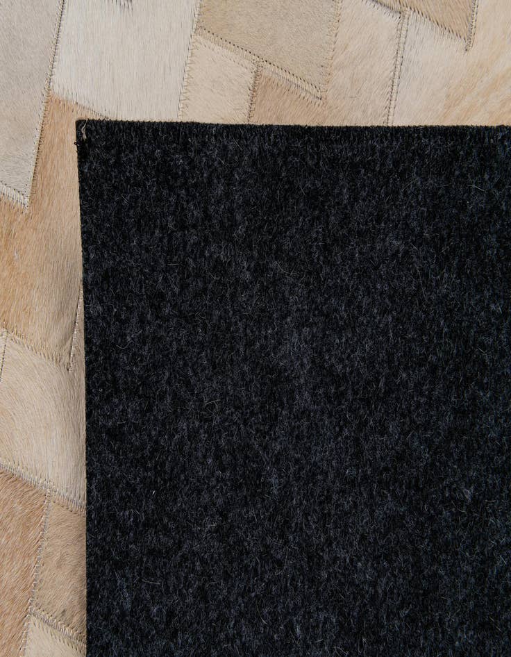 Detail image of 4' 1 x 6' Cowhide Stocks Rug