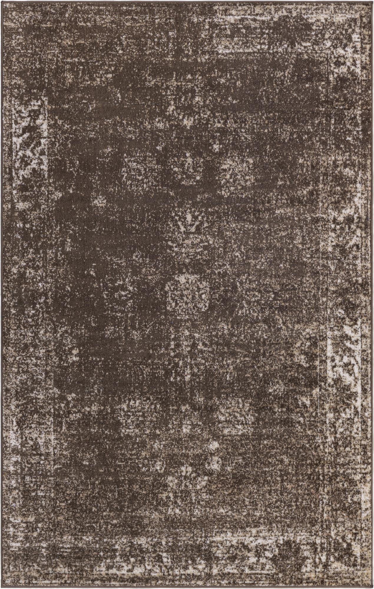 A 5x8 rectangular Monte Carlo rug featuring a distressed brown and tan Bohemian pattern with a subtle medallion design.
