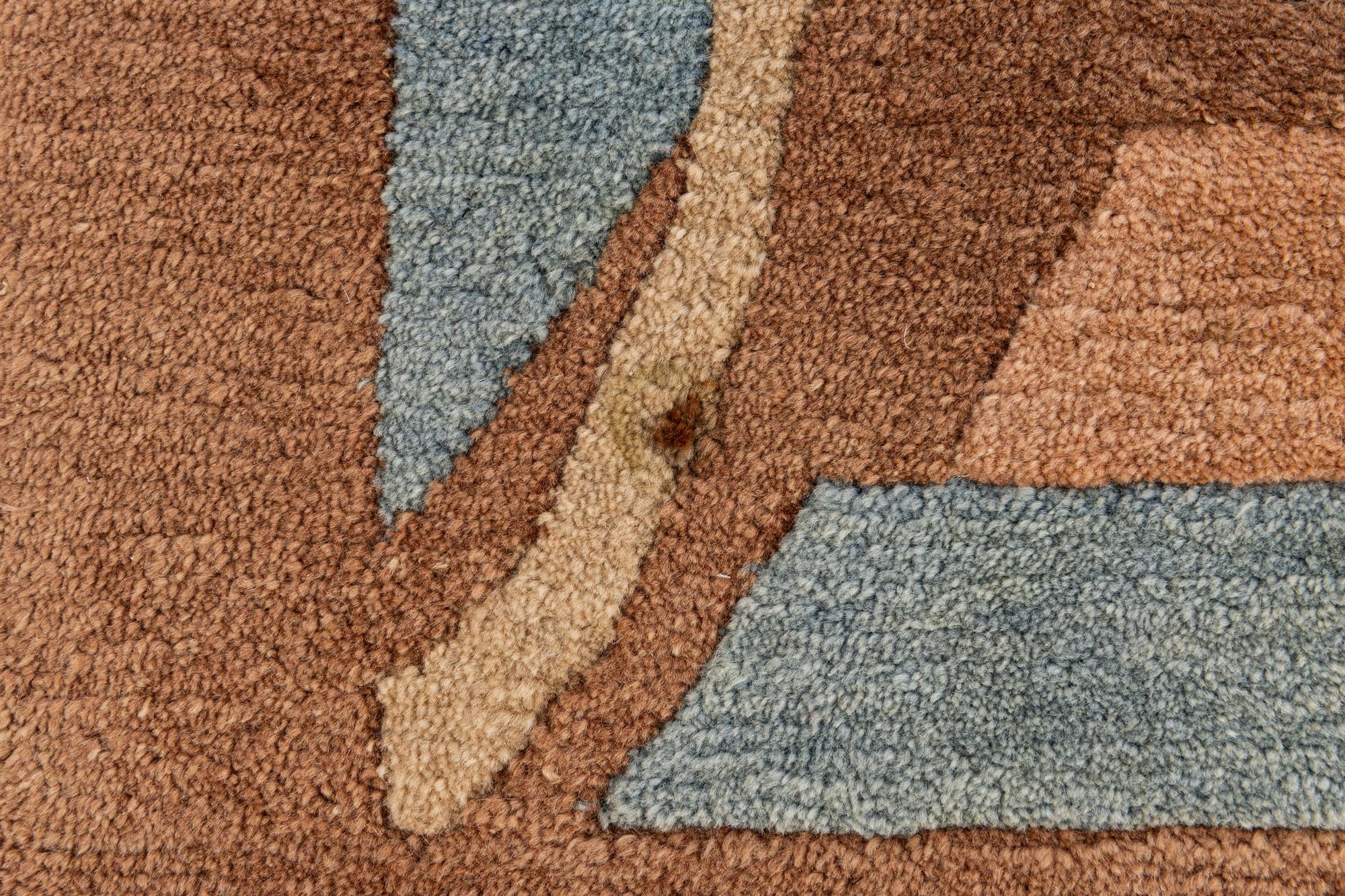 8' 1 x 11' 1 Hand Knotted Tibet Wool Rug