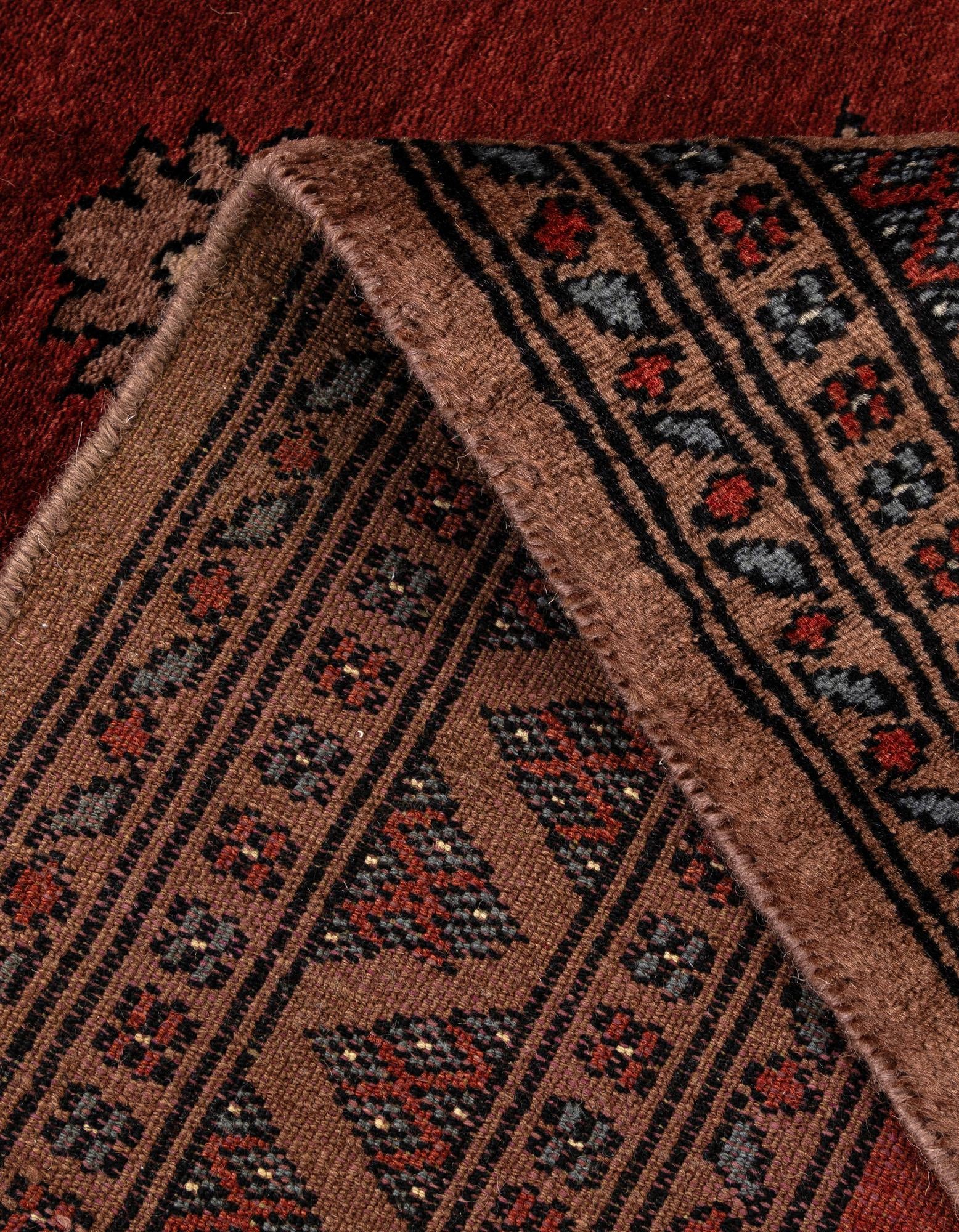 4' 1 x 6' 1 Hand Knotted Bokhara Oriental Wool Rug