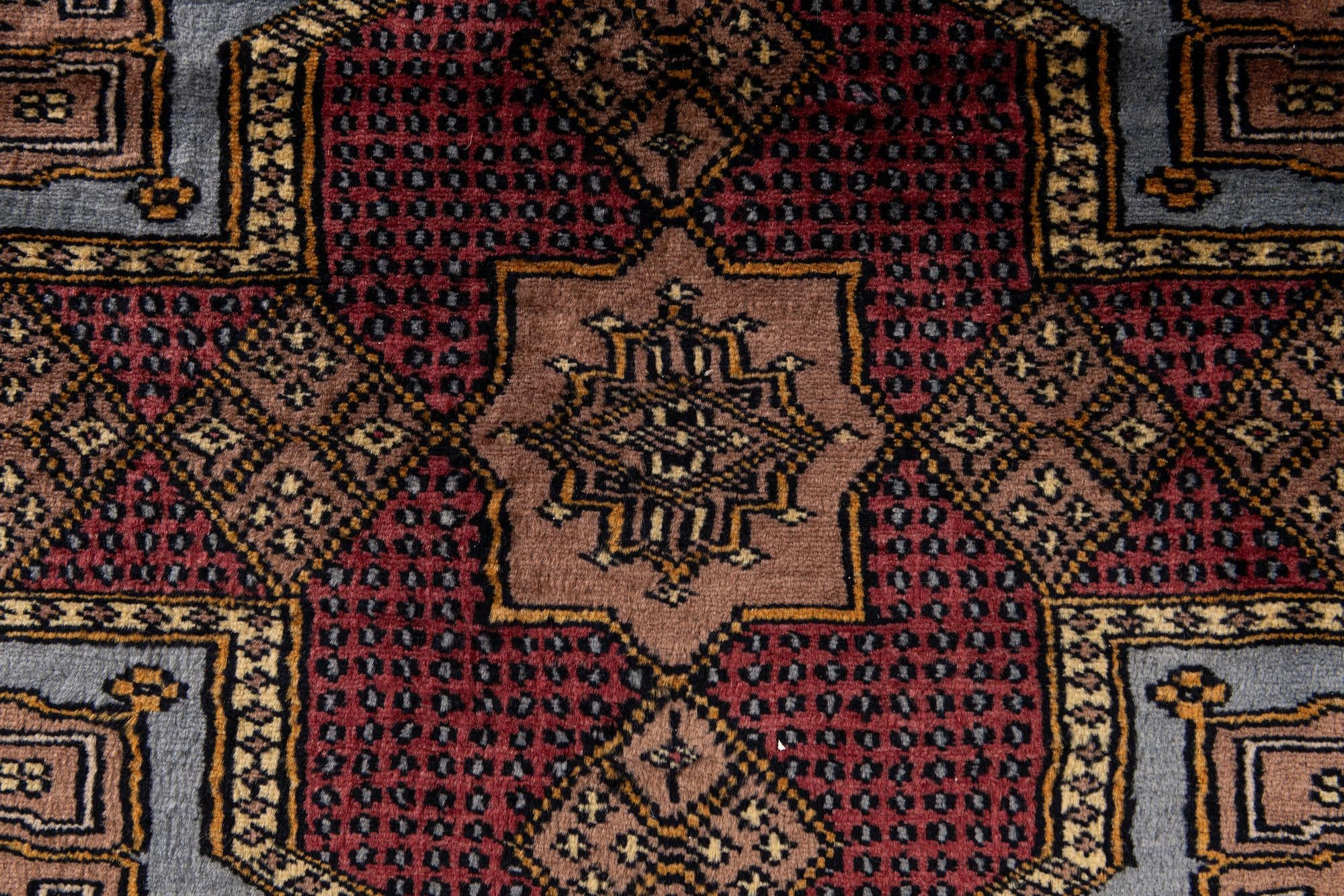 6' x 9' 11 Hand Knotted Bokhara Oriental Wool Rug