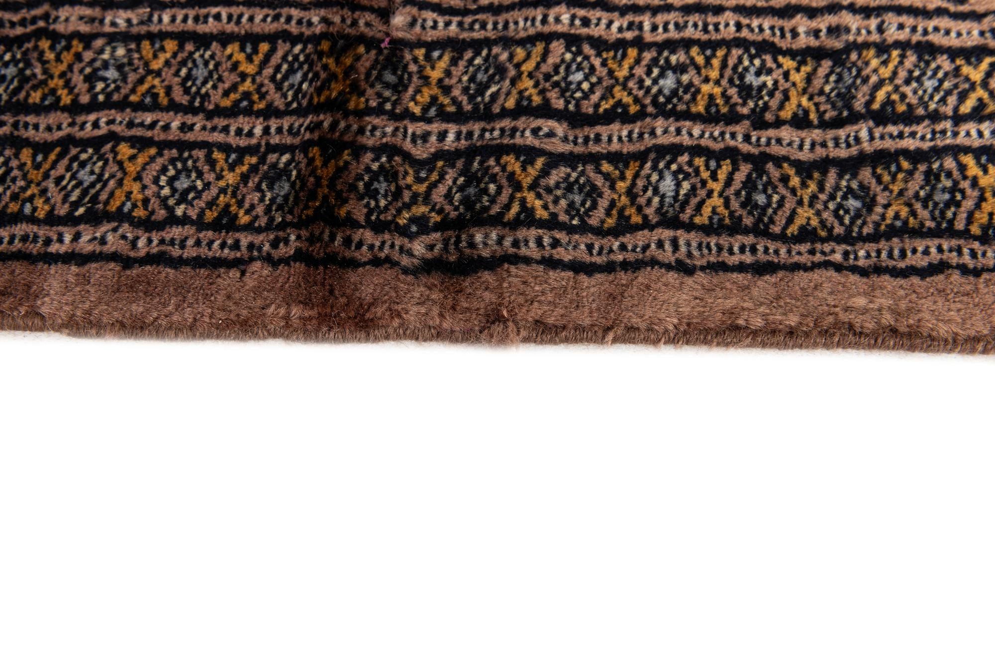 6' x 9' 11 Hand Knotted Bokhara Oriental Wool Rug
