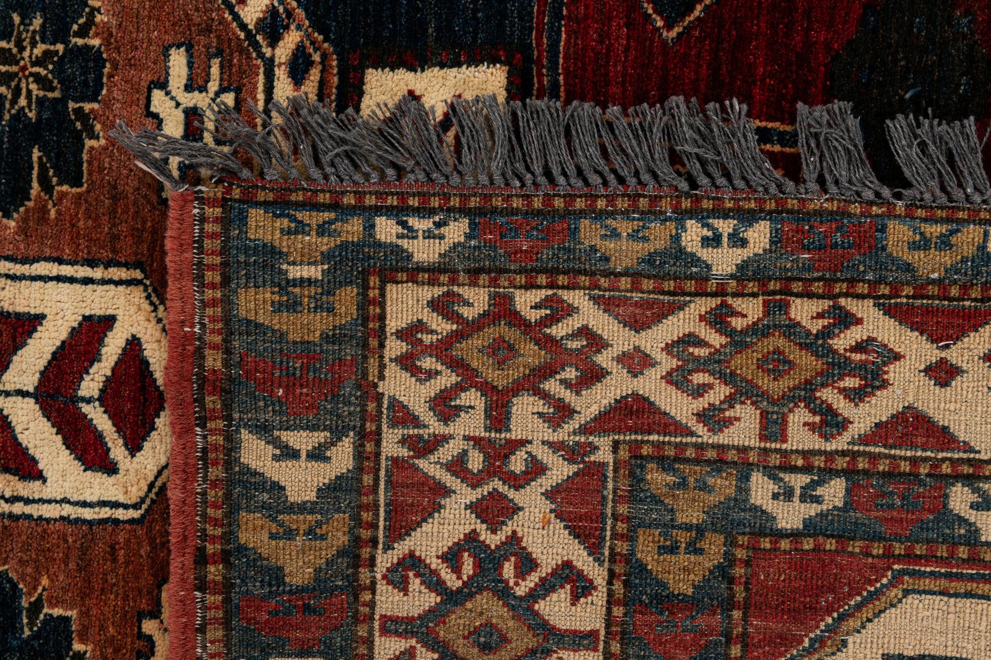 4' 11 x 6' 8 Hand Knotted Kazak Wool Rug