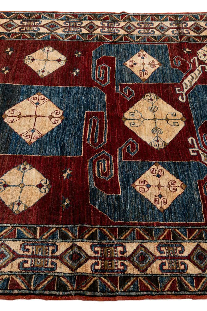 5' x 7' 5 Hand Knotted Kazak Wool Rug