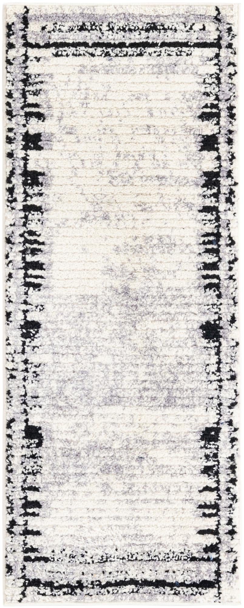 2' x 5' Cardew · Border rug, black and white