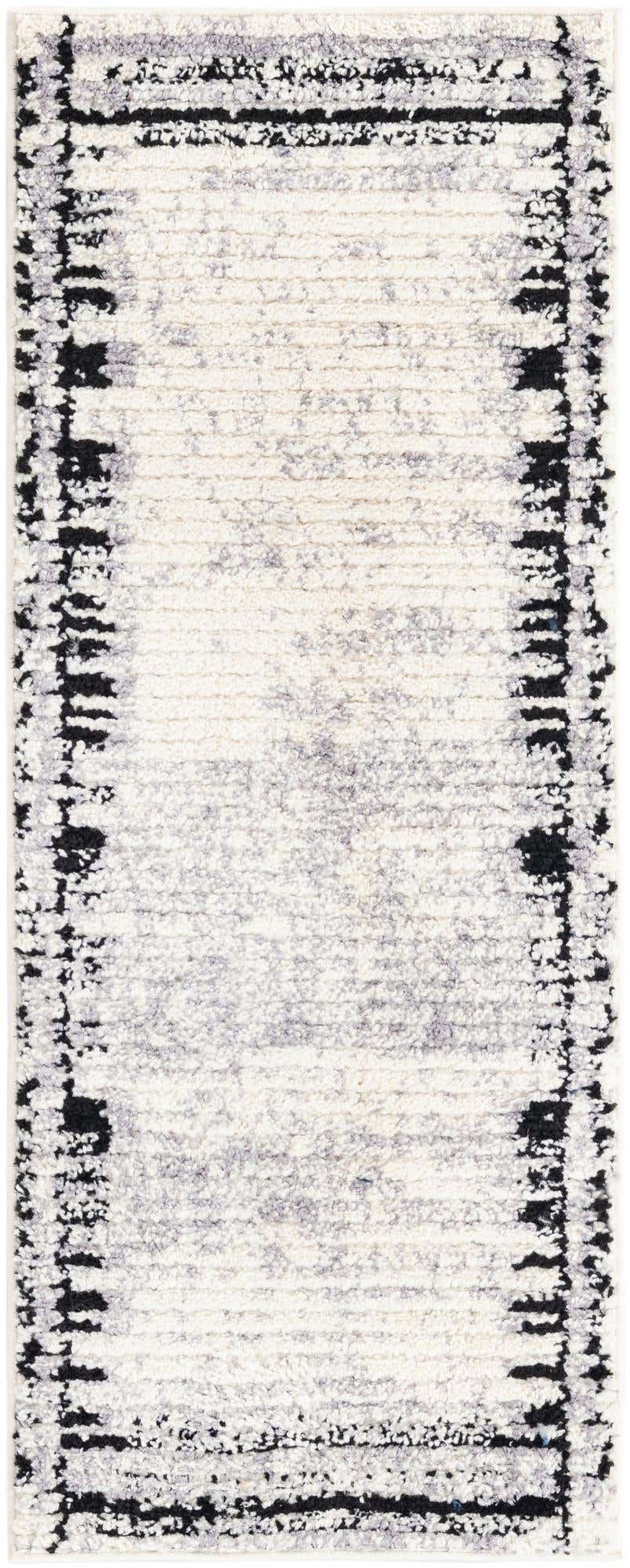 2' x 5' Cardew · Border rug, black and white